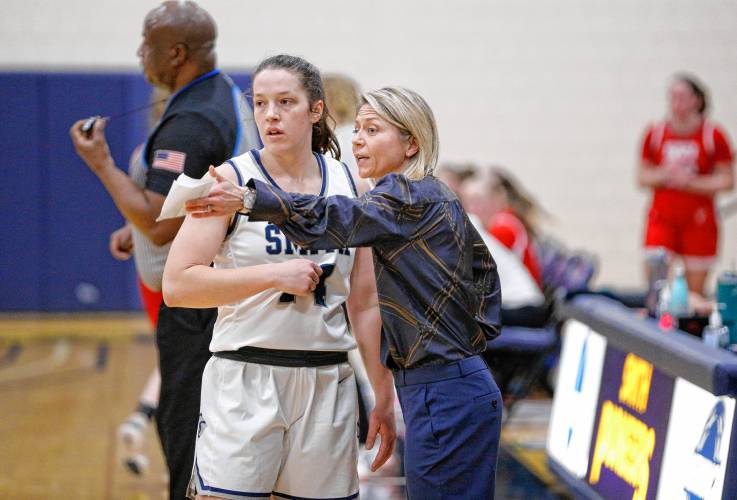 Smith College head coach Lynn Hersey talks with Jessie Ruffner in the third quarter against WPI earlier this season at Ainsworth Gymnasium in Northampton.