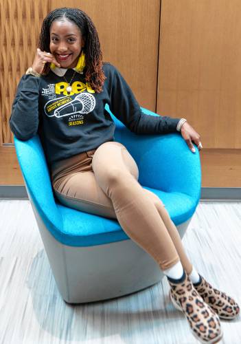 Poet Imani Wallace, who also goes by the stage name Lyrical Faith, is co-producer and host of the Third Annual Academy Regional Youth Poetry Slam. The event, a competition for young spoken word poets, is the only one of its kind in the Pioneer Valley.