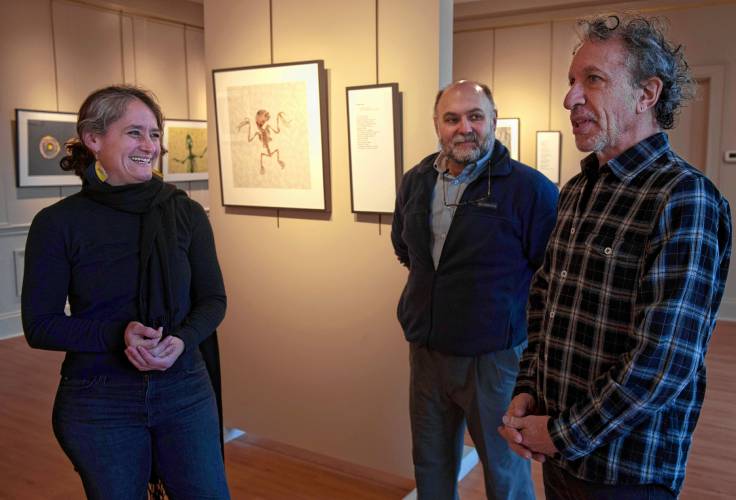 ABOVE: Writer and natural scientist Naila Moreira laughs with Paul Gulla, manager of R. Michelson Galleries, and photographer Stephen Petegorsky. Moreira and Petegorsky have put together a joint exhibit of poetry and photography, “Clearstories.” 
