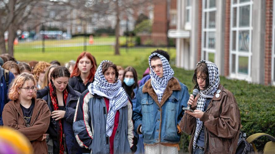 From right, Yana Zaghloul, 18, Arlo Greene, 17, Sanza Parzybok, 17, Oona Weaver, 17, and Ada Griffin, 17, attend a walkout in front of Northampton High School on Tuesday to protest the ongoing Israel-Hamas war. 