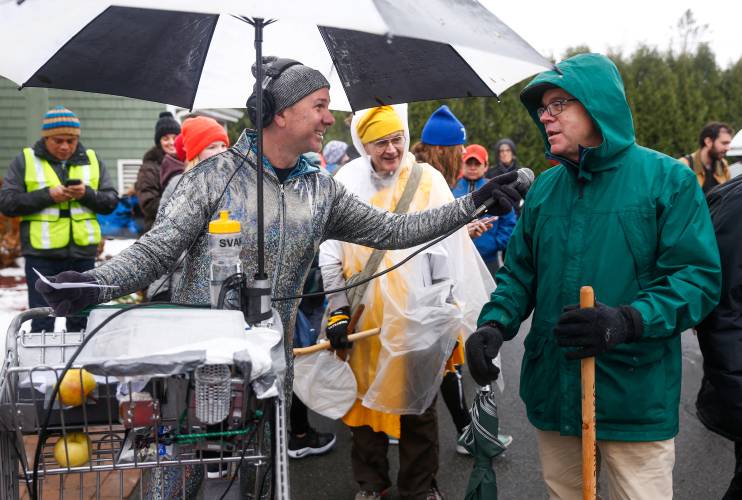 Radio personality Christopher “Monte” Belmonte talks with Congressman Jim McGovern during the 2018 Monte’s March.