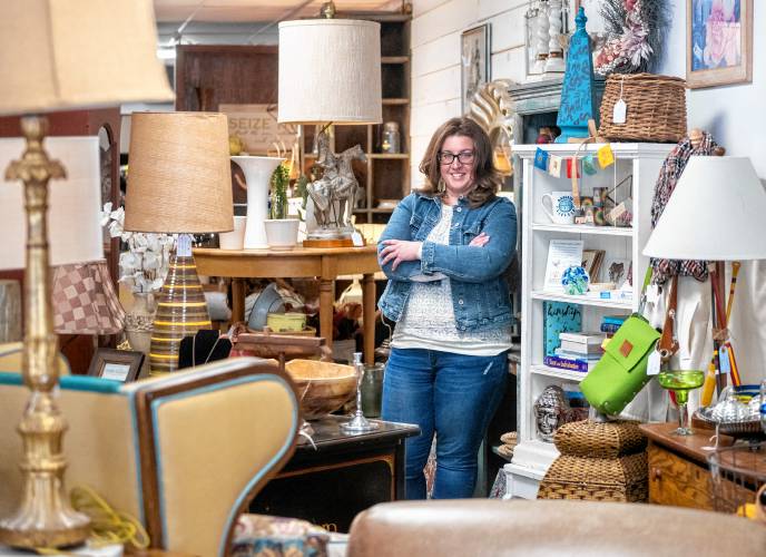 Skye Wellington at her consignment store Innovintage on Tuesday in Amherst. The business moved from downtown Greenfield in December to the old Kelly’s restaurant at 314 College St. in Amherst.