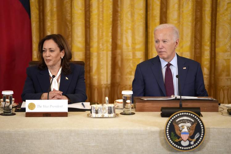 Vice President Kamala Harris, left, and President Joe Biden attend a trilateral meeting in the East Room of the White House in Washington, April 11, 2024. With Biden ending his reelection bid and endorsing Harris, Democrats now must navigate a shift that is unprecedented this late in an election year. Democrats are set to hold their convention in Chicago in August. 