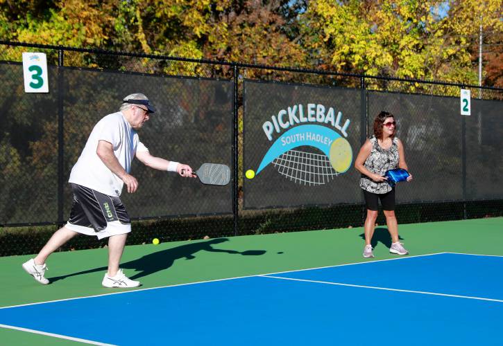Tony Chapdelain, left, and Roxanne Wood compete in the senior division of the 3-day pickleball tournament Friday at Buttery Brook Park in South Hadley.