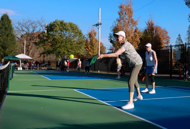 Carol Kuralt and Christine Dippolt compete against Hal Guillen and Evie Mikuszewski in the senior division of the 3-day pickleball tournament Friday at Buttery Brook Park in South Hadley.