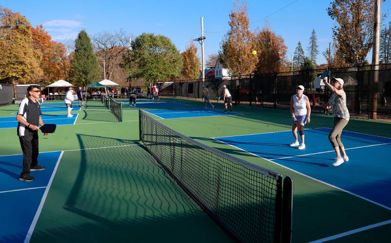 Carol Kuralt, right, and Christine Dippolt compete against Hal Guillen and Evie Mikuszewski in the senior division of the 3-day pickleball tournament Friday at Buttery Brook Park in South Hadley.