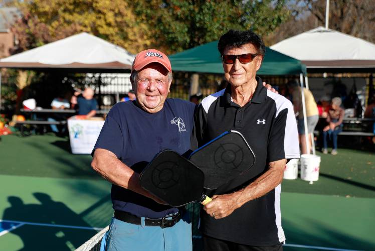 Hal Guillen, 88, right, and Chandler Stowell, 83, pose for a photo as two of the most senior competitors in the 3-day pickleball tournament Friday at Buttery Brook Park in South Hadley.